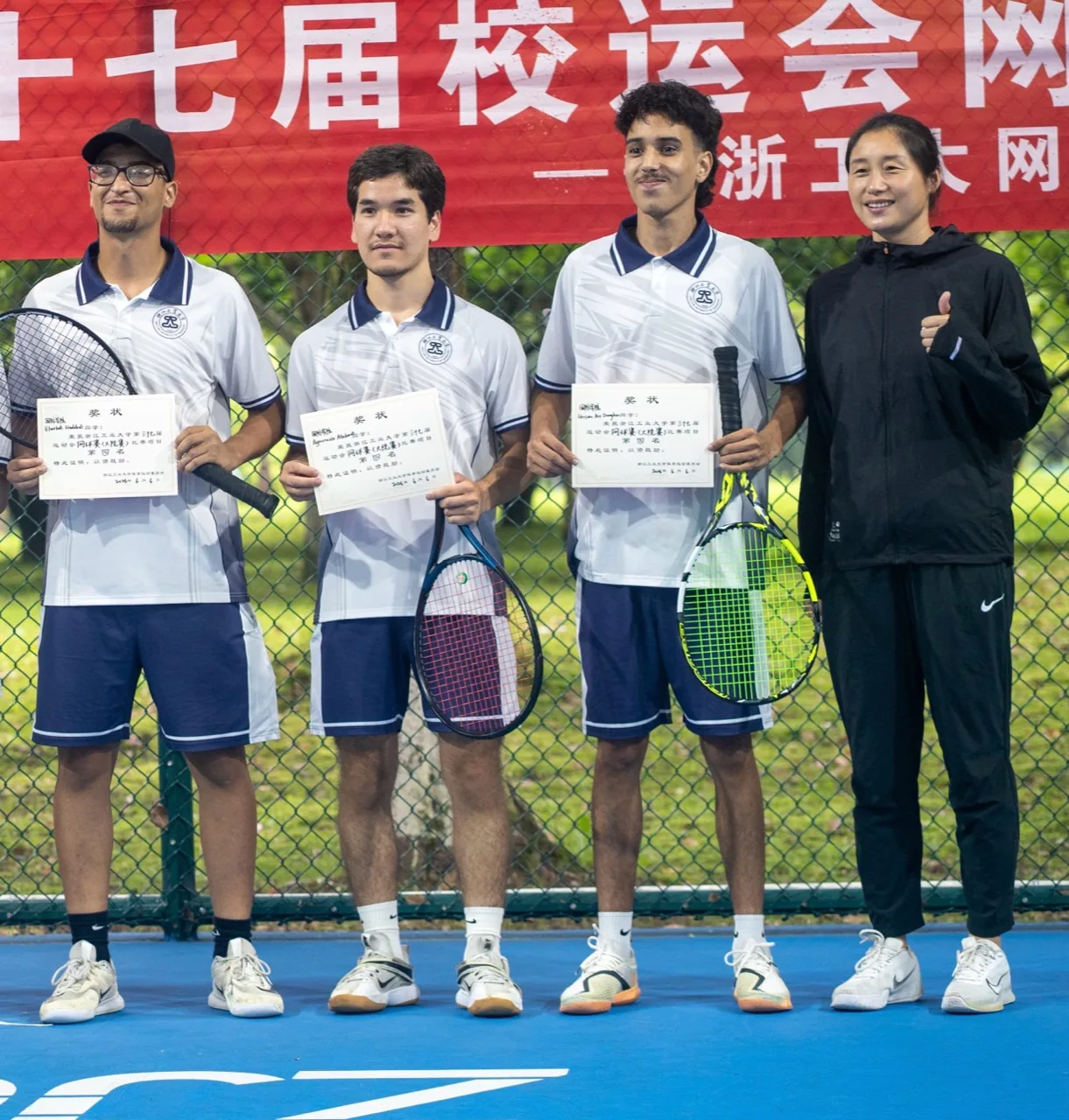ZJUT tennis team holding competition awards in their KAVOX polos